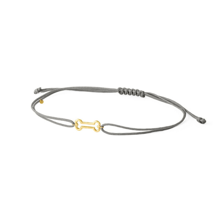 BRACCIALE OSSO IN ORO SU CORDINO BRACCIALE OSSO IN ORO SU CORDINO