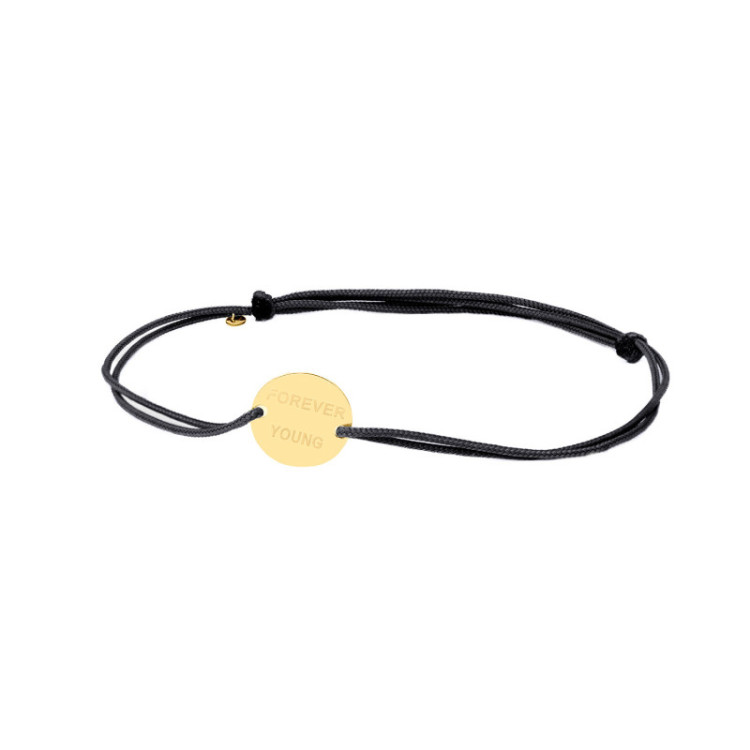 BRACCIALE TONDO IN ORO INCISO SU CORDINO