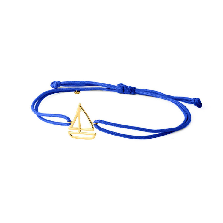 BRACCIALE IN ORO CON BARCA A VELA E CORDINO BRACCIALE IN ORO CON BARCA A VELA E CORDINO