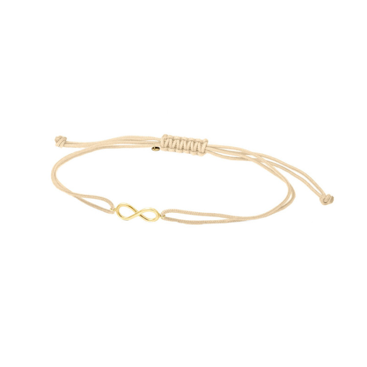BRACCIALE IN ORO CON INFINITO E CORDINO