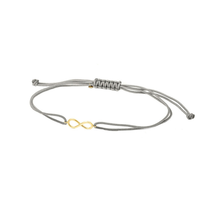 BRACCIALE IN ORO CON INFINITO E CORDINO