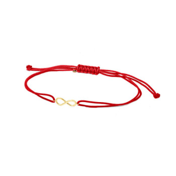 BRACCIALE IN ORO CON INFINITO E CORDINO