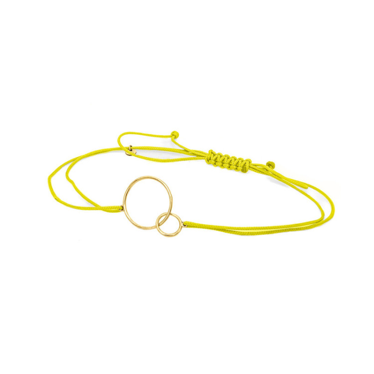 BRACCIALE CERCHI IN ORO SU CORDINO BRACCIALE CERCHI IN ORO SU CORDINO