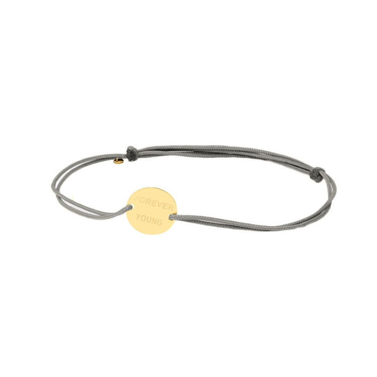 BRACCIALE TONDO IN ORO INCISO SU CORDINO BRACCIALE TONDO IN ORO INCISO SU CORDINO
