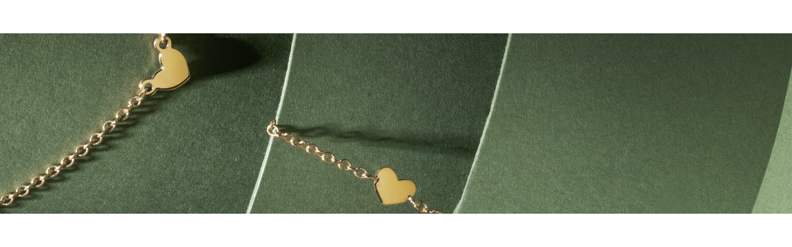 Collezione Aura | Gioielli simbolici cuori, stelle e quadrifogli |